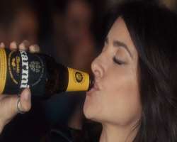 Penelope Cruz consuming alcohol
